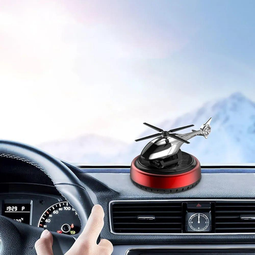 Helicopter car diffuser placed on dashboard lifestyle shot